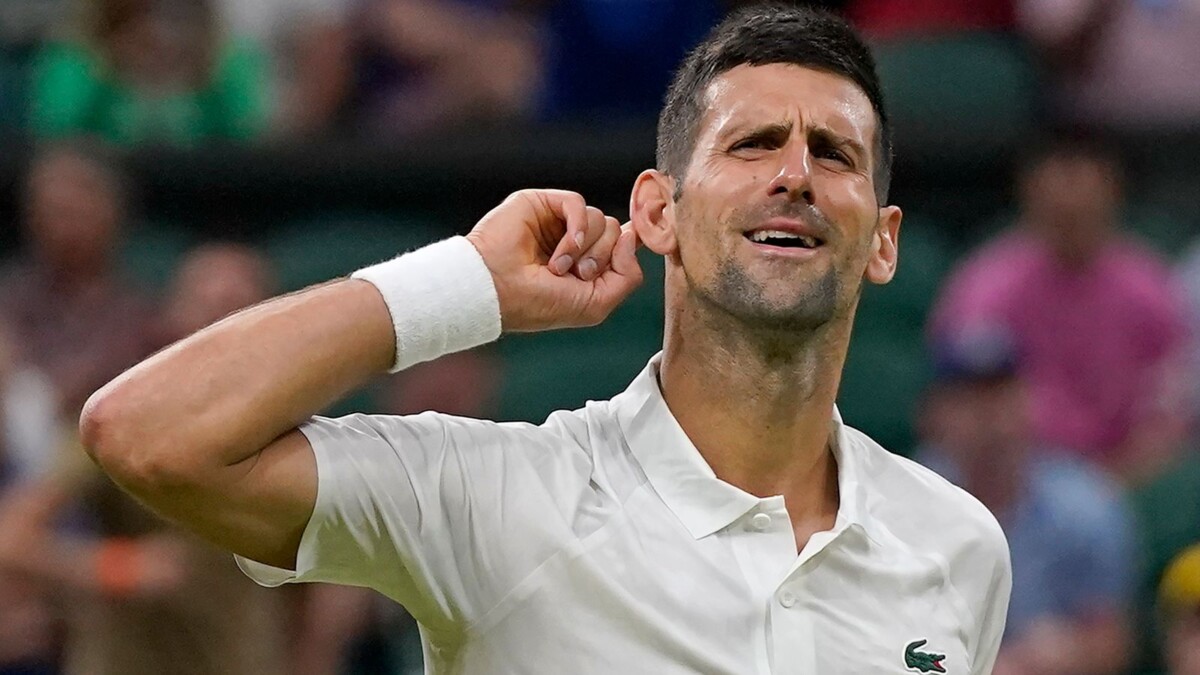 Wimbledon: Stan Wawrinka is brushed away by Novak Djokovic